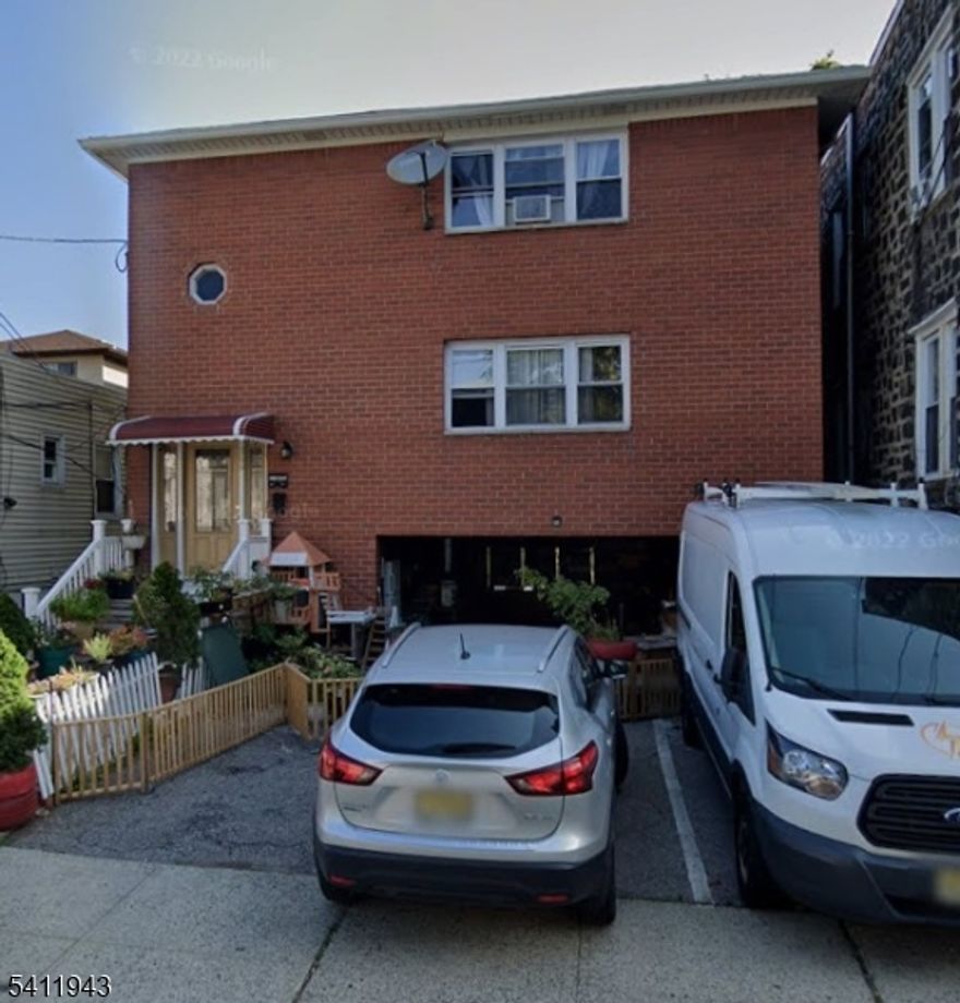 Discover this spacious and well-maintained two-family home, each apartment offering three bedrooms and one full bath. Located on a quiet residential block in Fairview, the street ends at Broad Ave, providing added privacy and minimal traffic. The property includes a finished basement, two garages, and is conveniently close to transportation, shopping, and schools. Excellent opportunity for both owner-occupants and investors seeking strong rental potential.