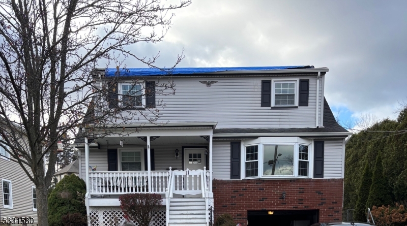 Renovated 4 bedroom, 2.1 bath home in prime location with large level backyard, patio.  Living rm, eat-in kitchen, 1st flr bedroom, full bath, 2nd floor (primary bedroom), 2nd bedroom, 1/2 bath; lower level 4th bedroom w/full bath; could be used as a home office/den/rec room. charming open covered front porch, garage; walk to town center for dining and shopping. Close to all major highways for easy commuting.