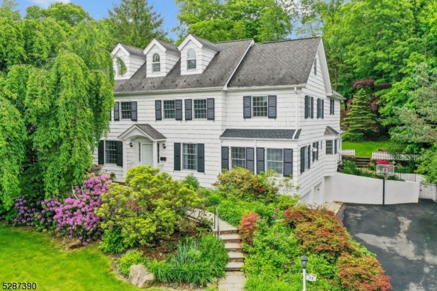 Mint Condition 4 bedroom Colonial, every inch of the interior has been done, ideally located on a lush 0.67 acre lot on a quiet street just a 0.5 mile walk to highly ranked Deerfield Elementary School, and just 0.3 miles to Old Short Hills Park & Greenwood Gardens! Gorgeous, huge, eat-in kitchen with center island, designer cabinetry, and top of the line appliances is totally open to the sunlit Family Room with new Pella sliders that provide easy access to the immaculate, level backyard with mature landscaping and great privacy. The living room features a gas fireplace with traditional wood mantel, 2 built-in bookcases. There is a great home office that is a terrific potential in-law suite with 3 windows and built-in bookcases. The home features a grand impressive exterior, all newer bathrooms, beautifully finished 3rd level with a potential 5th bedroom or bright home office with skylights, all new Pella thermal windows, a charming screened porch, a whole house generator, state of the art security system, underground sprinkler system, 4 newer HVAC systems, and 2 newer 75 gallon gas hot water heaters. The property is absolutely stunning, your own private oasis, with a cedar gazebo with tremendous views of the property and great privacy from mature trees. This Short Hills gem in the ideal location on a large, immaculate 0.67 acre lot, walking distance to top school & parks is the dream home you've been waiting for! Architect confirmed room for a pool!