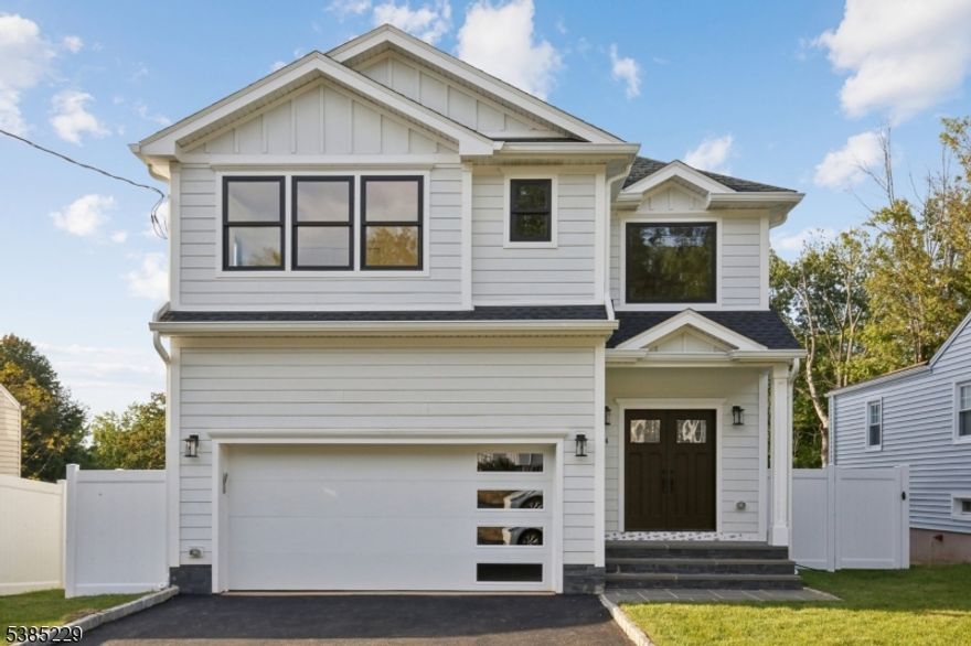 Stunning NEW CONSTRUCTION 6 Beds/5 Baths colonial located in the heart of sought after New Providence. Close to vibrant downtown, train station, all 3 schools and playgrounds. Featuring an open concept floor plan, this home is elegant, bright&sunny, the layout flows seamlessly from room to room. Boasting a gourmet eat-in kitchen w/ Thermador SS appliances, Fabuwood soft-close cabinetry, Calacattta quartz countertop & glass tile backsplash. The kitchen is totally open to dining room and family room w/ coffered ceiling&gas fireplace. 2 sliding doors let in tons of natural light and lead to the deck oversee the back yard&park view. A spacious 1st floor bedroom, an elegant full bath, oversize attached 2 garage complete the 1st level. Upstairs, the luxurious master suite includes designed tray ceiling, His&Her WIC and a spa-like bath w/ dual sinks, free standing tub, huge stall shower & separate toilet room. One generous bedroom completed w/ a full bath, 2 more bedrooms share one full bath, laundry room finish the 2nd level. The finished WALK-OUT basement w/ 9 feet ceiling offers more amazing space w/ huge recreation room, storage rooms and a bedroom w/ full bath which can be used as an in-law suite. This home also boasts superb craftsmanship, Anderson window, 4" hw floors, Kohler fixtures, solid core interior doors, designer lights, Nest thermostats, Benjamin Moore painting, Hardie plank siding w/ Azek trim,  huge paver patio, new sod, private fence, builder's warranty. Must see!