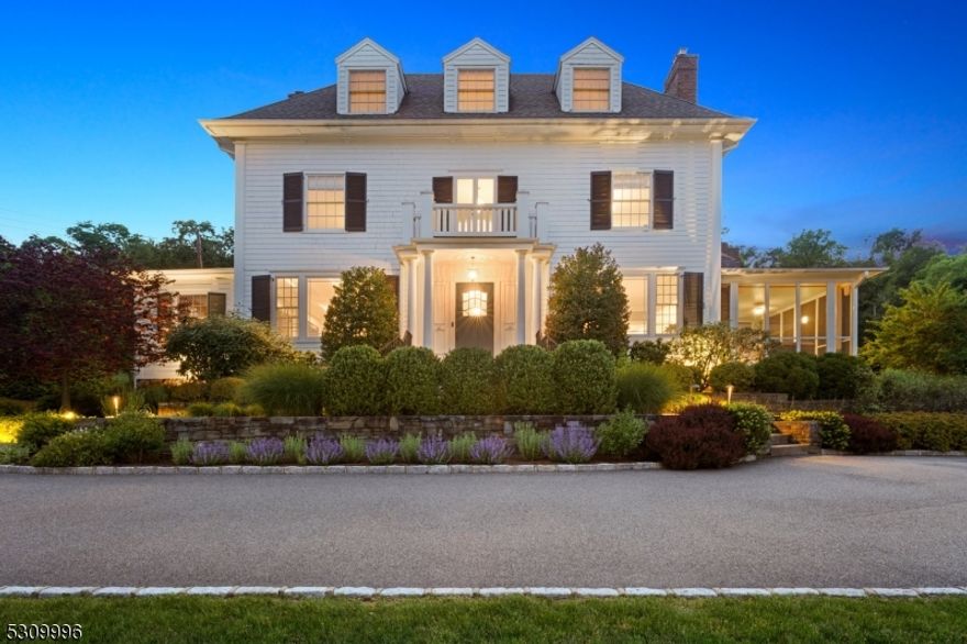 "My favorite house in Montclair," says EVERYONE! Timeless elegance meets quiet, modern luxury in a breathtaking setting. Perched on 1.5 acres with lovely views of Manhattan skyline & surrounds, this beloved gem offers an unparalleled blend of historic charm, meticulous finishes & contemporary comforts. A sophisticated lifestyle for the best of all worlds: 13 miles from NYC & blocks to both Watchung Plaza & vibrant Uptown with restaurants, shops & the NYC train. High, coffered ceilings, huge windows, stunning staircase, meticulous architecture & celebration of detail with a comfortable, inviting scale. Olympia Dukakis called it home for 30 years. Chef's Kitchen with new family room addition leads out to inviting new, private bluestone patios with impressive perennial plantings & expansive lawns. Screened-in porch suggests another sunrise vantage point for morning coffee. Upstairs, unwind in your luxurious primary ensuite with newer marble bath & fabulous custom dressing room. Two additional bedrooms & sitting room on the 2nd floor along with an updated hall bath. 3rd floor has another hall bath & two additional bedrooms (one used as a Rec Room) & so much storage. Dry, lower level gym with wine room & laundry center. Central Air, 3 fireplaces (2 are gas), hardwood floors & ALL the upgrades. Warm & welcoming, not pretentious. 2 car stone garage & storage above. From the moment you step inside you'll know - this house will make your life better!