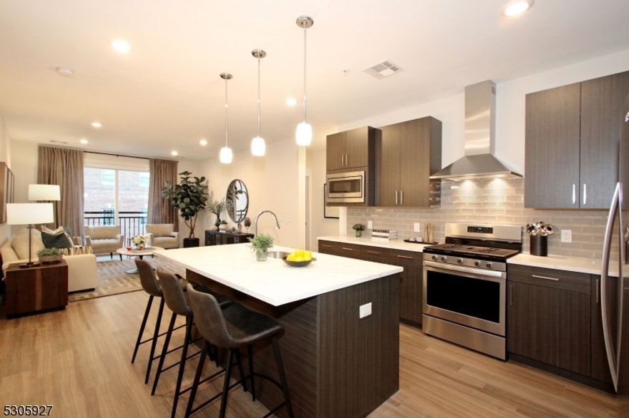 Discover upscale apartment living in the heart of Morristown. With elegant interiors, high-end amenities, and a vibrant downtown at your doorstep, this is more than a home, it's a lifestyle. Perfect for those who seek luxury and convenience in one of New Jersey's most coveted locations.  30 Court offers 58 exquisitely designed 2-bedroom, 2-bath residences, some featuring private patios/balconies, or dens. Ranging from 1,276 to 2,000 sq. ft., 30 Court offers some of the largest Apartments available in the area with 9 ft ceilings, gourmet kitchens with quartz counter tops, stainless steel appliances, tiled back splash, built-in microwaves and designer cabinetry. The primary suites offer a sanctuary with expansive WI closets, dual vanities and walk-in showers. All residences feature an in-unit laundry room with added storage. Thoughtfully designed, A201 offers over 1,265 sq. ft. of elegant living space, featuring a split layout separating the primary suite from the 2nd bed and bath-ensuring the ultimate privacy. Perched on Morristown's highest ground, enjoy peace and seclusion while being steps from downtown Morristown's vibrant Green, world-class dining, shops, & NYC Direct. Amenities include a on-site staff, private gated parking, a 24-hr fitness ctr, sophisticated clubroom, resort-style courtyard with fire pits and grills. Live the sophisticated lifestyle you deserve.  One mo. Free on a 13 Mo. Lease!