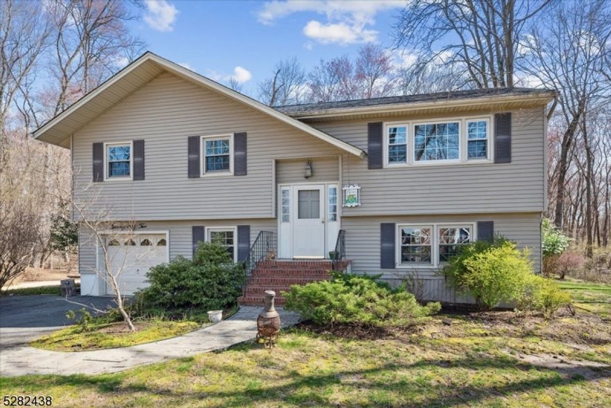 Highest and Best offers extended to 5/9/2024 as many missed the instructions in offer guidelines. BACK ON MARKET - First time on the market! Lovingly cared for 4-bedroom home has is just what you have been waiting for. Main level boasts hardwood floors, lots of natural light, kitchen, living room, dining room, three generously sized bedrooms and a full bath. Sliding doors off the dining room leads to an oversized deck to sit and enjoy the birds and local wildlife. A lovely pond sits at the back of the property which was dug when the house was built, and walking trails weave through the beautiful wooded lot. Lower level offers an additional bedroom and family room, full bath, laundry room and oversized garage. Additional sliding doors lead to ground floor covered patio. Lincoln Park has a bustling downtown with lots of shopping, restaurants and things to do.Dont wait this one wont last. Last time property had water was hurricane Irene. Attached is the elevation certificate and a verified flood insurance quote.