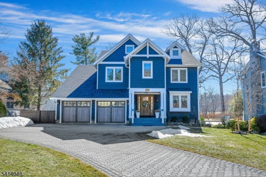 Live the lakefront lifestyle in this beautifully renovated home offering four levels of exceptional living and luxury amenities throughout. Designed for both comfort and entertaining, the home features a private elevator and beautifully appointed living spaces with room for everyone. Step outside to your own lakeside backyard oasis perfect for relaxing by the water or hosting unforgettable gatherings. Ideally situated across from the golf course and just minutes to local beaches. Enjoy a short boat ride to the iconic Lake Mohawk Boardwalk and Plaza for waterfront dining, entertainment, and charming boutique shopping.  Welcome Home ...