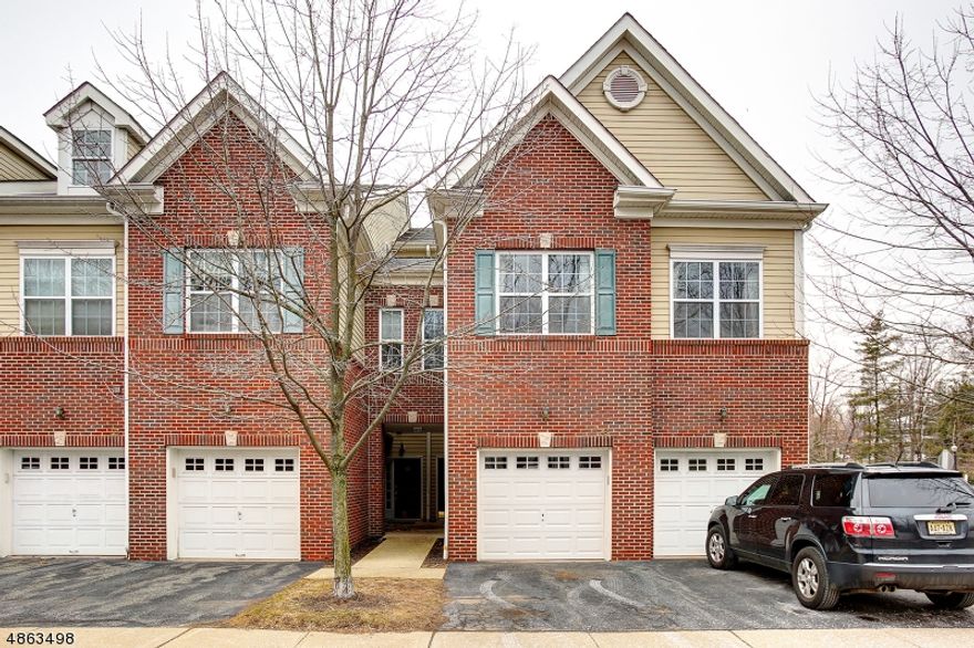 Freshly painted, hardwood floors. Bright and spacious unit! Open concept with Living Room and Dining Room with hardwood floors. Kitchen has newer wood like flooring. Half bath on first level. High ceilings in Living and Dining room. Go to second floor and you have a loft perfect for playroom or office. A large master suite with sliding glass door to veranda over looking yard. Full Master Bath with separate shower and tub.  Second bedroom has large closet. Hallway full bath on this level.  Laundry room on this level by bedrooms.  One car garage with opener.