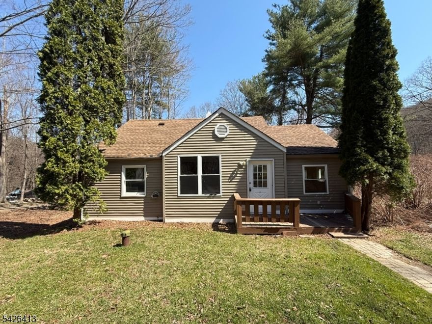 Big charm, smart value, and endless potential in the heart of Jefferson Township! This inviting beige Cape Cod offers more than meets the eye, delivering a warm and functional layout perfect for today's lifestyle. The sun-filled main level welcomes you with a bright, spacious living room that flows seamlessly into a delightful dining area ideal for both everyday living and entertaining. An efficient country kitchen provides a cozy and practical space to cook and gather, while the majestic main-level primary bedroom and full bath offer convenience and comfort. Upstairs, you'll find two additional bedrooms, perfect for guests, home office space, or creative use. The lower level features high ceilings, garage access, and a walk-out to the backyard presenting a fantastic opportunity to create additional living space, a recreation area, or workshop tailored to your needs. Enjoy all that Jefferson Township has to offer, including close proximity to the beautiful Lake Hopatcong New Jersey's largest lake offering boating, fishing, and waterfront dining. Outdoor enthusiasts will love nearby parks, hiking trails, and recreational facilities, while convenient access to major roadways, shopping, dining, and local schools makes everyday living a breeze. While the home could benefit from some updates, it's a true value-add opportunity with tremendous upside for buyers ready to bring their vision to life. Charming Cape is packed with potential and ready for its next chapter!