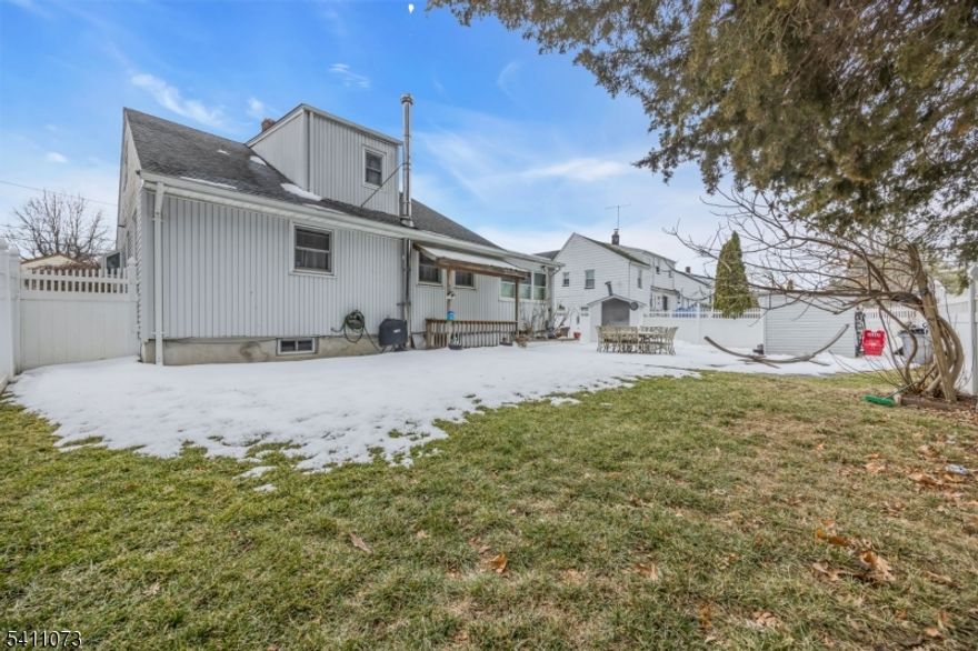 This beautifully maintained, move-in ready home offers a spacious layout & thoughtful updates throughout! Enter into a welcoming living & dining room featuring gleaming hardwood floors, crown molding & a bay window that fills the space with natural light. Both rooms open to the beautifully renovated kitchen, completed in 2014, which features marble countertops that extend seamlessly to the backsplash, custom cabinetry, newer stainless steel appliances & a center island. Beyond the kitchen, an office leads to the family room with access to the yard. The first floor also includes 2 spacious bedrooms and a modern full bathroom with a tub & separate shower. Upstairs, you'll find 2 additional generously sized bedrooms & a renovated full bath with an oversized walk-in shower. The finished basement offers additional living space & includes a second kitchen, a large rec room with a bar & wood-burning stove, a cedar closet, half bath, laundry room & utility room. Outside, the flat, fully fenced backyard features a large paver patio & storage shed, with pavers extending to the driveway. Additional highlights include a one-car attached garage, two sump pumps, a roof approx. 8 years old, a water heater approx. 8 years old, and furnace/central air systems installed 4 years ago. NOT IN A FLOOD ZONE! Conveniently located near Morris Ave, bus routes to NYC, schools, parks, & major highways including Routes 22, 78, 24, & GSP, as well as nearby shopping & dining options. Don't miss this one!