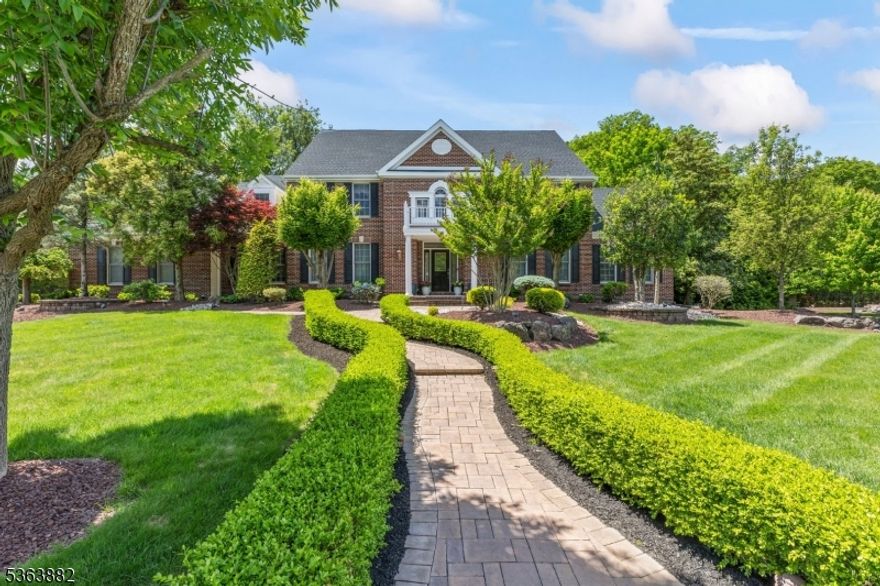 A rare opportunity to live in one of Marlboro's most prestigious developments. Situated on a quiet Cul-de-Sac, this magnificent colonial backs up to a conservation area for ultimate privacy. 1st floor features 2-story foyer w/ porcelain tile. Formal DR, tray ceiling, dec molding. Hardwood floors, dec molding throughout. Spectacular gourmet kitchen, center island, granite counters, new SS appliances, coffee bar, 2 pantries. Formal LR w/ French doors, conservatory, cathedral ceilings. Sunken family room, renovated gas fireplace, new Hunter Douglas window treatments. Bonus room off kitchen can be used as home office or bedroom. Upstairs, primary bedroom has tray ceilings, gas FP, sitting area, large custom WIC. Hunter Douglas window treatments. Hardwood floors throughout. Master BR has His and Her sinks, dressing area, jacuzzi tub, private bathroom closet. 3 additional bedrooms and 2 bathrooms including a Jack and Jill bathroom. Full, finished WALKOUT basement, engineered wood floors, custom bar, home gym, sauna w/ full BR, movie theater, living room area, storage. Walk-out basement w/ stone walkway leading to resort style backyard. Professional landscaping surrounds entire property. In-ground, gunite heated, salt water pool w/ spa, diving rock. Ample seating, stone fireplace, built in bbq. Fenced dog area. TOP rated Marlboro schools. Conveniently located to shopping, fine dining, parks, commuter service, major highways, Jersey Shore.