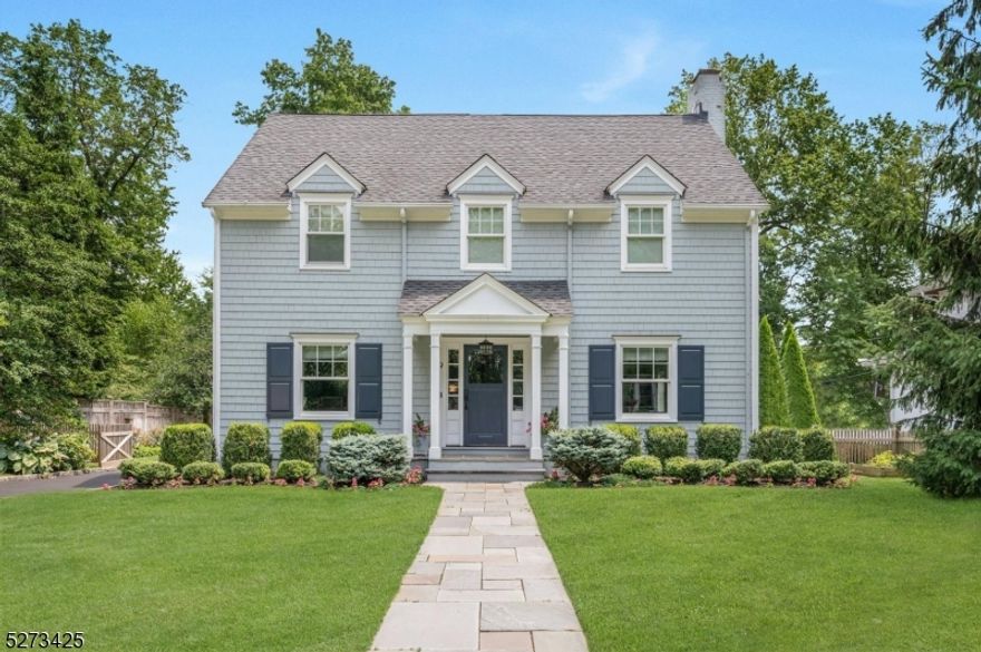 IN TOWN LOCATION - Center Hall Colonial nestled in one of Summit's highly sought-after neighborhoods. Located just a half-mile from Summit Train Station, a stone's throw from Lincoln-Hubbard Elementary School, crowned #1 in NJ by US News and World Report, and convenient to Summit Middle School, Summit High School, and Kent Place School. Upon entry, guests are greeted by a welcoming Foyer flanked by a cozy fireside Living Room and Dining Rooms. The heart of the home lies in the Kitchen with white shaker cabinets, professional grade appliances, and stone counters, seamlessly flowing into the Family Room with its vaulted ceiling and wall of windows providing abundant natural light and a panoramic view of the backyard. Next to the Family Room is a convenient Mudroom with access to the flat and fully fenced backyard. Completing the main level is a fresh Powder Room and a generously proportioned Office. Ascend to the second floor to find the Primary Suite with a private bath. Two additional bedrooms and a Hall Bath are also located on this level. The third floor is home to two additional Bedrooms and another Hall Bath. The lower level encompasses the Recreation Room, a spacious Gym boasting lofty ceilings, and the Laundry and Utility Rooms. Welcome home to this move-in ready gem where comfort meets convenience.