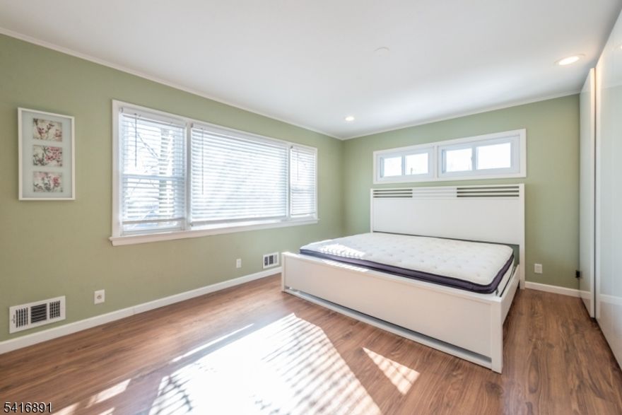 Charming, immaculate, fully renovated, spacious, open floor plan ranch home available is for rent. Located on a quiet cul-de-sac street in the Gregory section of West Orange. This house has everything to offer. Beautiful foyer entrance with custom storage, gleaming floors, freshly painted open floor plan (living room/dining room) combo with beautiful windows with direct sunlight and a gorgeous view. Large eat -in renovated kitchen with plenty of counter space. Also, includes side entrance on the main floor with 1/2 bath and laundry room. The main floor consists of 4 large bedrooms with built in wardrobes, walk in closet and master bath and a hallway full bath. The downstairs includes a fully finished walkout basement with an office/bedroom, kitchen, full bath, entertainment room, separate entrance with an attached 2 car garage . Jitney to NYC transportation across the street. NTN Tenant application required with references.