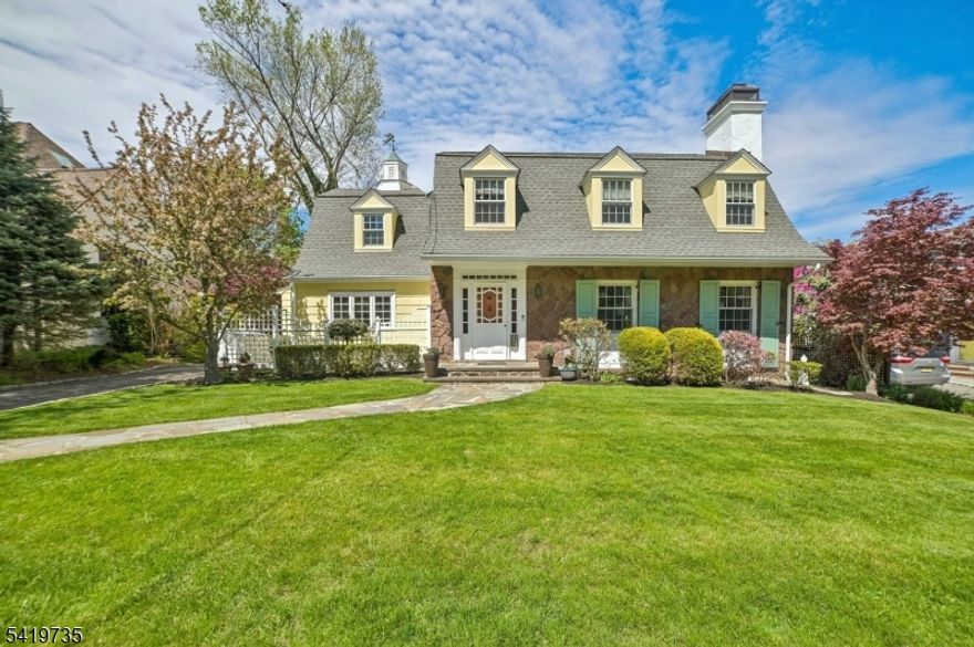 *FABULOUS SHORT HILLS COLONIAL. PRIME  LOCATION. WALK TO TOWN, TRAIN & SCHOOL.* Welcome to 11 Hawthorne Road, a fully renovated 4BR, 3.2BTH Colonial nestled on a quiet lane in the coveted Knollwood section of Short Hills. Classic architecture & modern amenities blend seamlessly to create a spacious & warm home. The main level features a welcoming foyer, stunning LR w/ wood burning FP, gracious DR w/ bay window & private home office w/ custom built-ins. The gorgeous eat-in kitchen/family room is the heart of the home, & features professional grade SS appliances, granite counters, marble clad island, step-down family room w/ breakfast nook & french doors to the yard. Upstairs find 4BR & 2.5BTH. The primary suite features a wall of custom closets & a private ensuite bath. 2 more BR share a hall BTH, while the 4th BR has its own half BTH. The finished lower level has a rec room, laundry, craft room, full BTH with steam shower and plenty of storage. Head outside to a gorgeous, level yard with open lawns, flowering trees, patio and garage built in 2017.  All this in a fabulous Short Hills neighborhood where block parties, bike riding and trick-or-treating abound!  Welcome home!