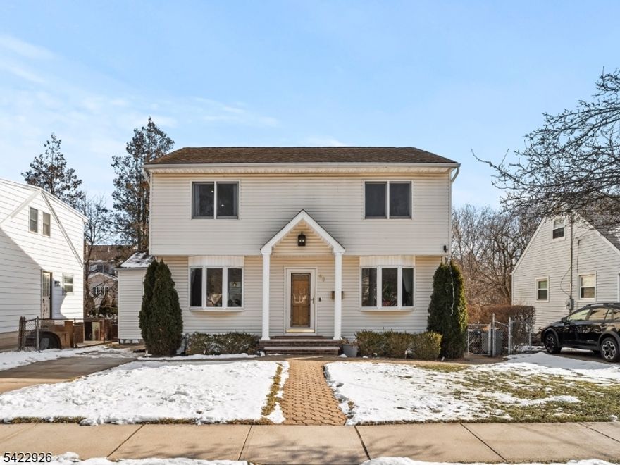 Welcome to 43 Ploch Road, a beautifully remodeled residence in the desirable Albion section of Clifton. This spacious 4-bedroom, 2.5-bathroom home features an open-concept layout and new hardwood floors throughout. The chef-inspired kitchen is the heart of the home, boasting quartz counters, custom cabinetry, a grand center island with seating for 6, stainless steel appliances, a double oven, pot filler, and a beverage/wine fridge. Sliding glass doors open to a gorgeous backyard with an inground saltwater pool (new liner) and a storage shed. The second floor includes a laundry room and the main bedroom suite, which features a walk-in closet and a luxurious bath with a smart toilet. Recent updates include new AC and a new Navien hot water/furnace combo unit. This home combines modern living with a location offering easy access to major amenities and transportation.