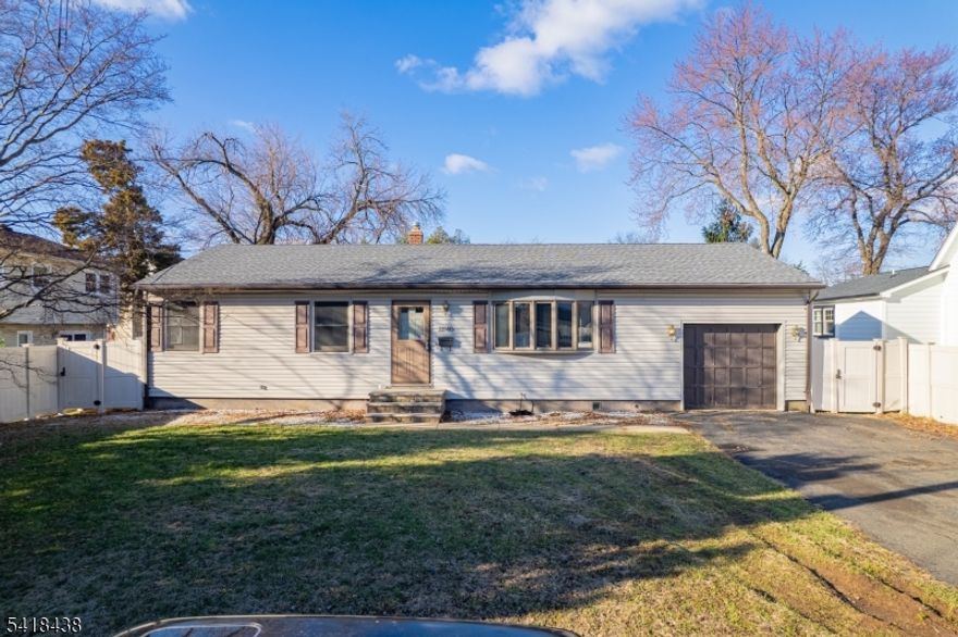 Charming Ranch style house in the heart of highly desirable South Plainfield. The inviting living room is perfect for entertaining and relaxing. The beautiful sunroom with new LVP flooring overlooks the back yard. Large eat-in kitchen w/ stainless steel gas stove, microwave, and dishwasher. Newly painted walls. Newly sanded and stained original hardwood flooring throughout. Full finished basement w/ wet bar, recreation room w/ electric fireplace, extra rooms, and newly installed LVP flooring. Attached garage w/ paved driveway. Forced hot air heating and central AC throughout. Large backyard. Pride of Ownership comes with the opportunity to make this home truly your own. Located in a friendly and quiet neighborhood near schools, access to major highways, and transportation to NYC. 18 minutes to Whole Foods. Property is being sold strictly "as-is". Buyer is responsible for obtaining fire cert/CO with town. Owner of the LLC which owns the property is a licensed Real Estate Broker. Survey and Seller's Disclosure Statement available. Priced to sell.
