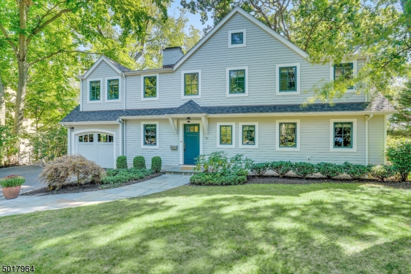 Experience the upscale lifestyle and understated elegance of this NYC chic residence where luxury and leisure meet. Tucked away in a sought after location on nearly 1/2 acre in Old Short Hills, this 5 bedroom home has been entirely expanded and renovated to perfection with thoughtful enhancements and upgrades that include a neutral designer palette, voluminous two-story foyer, large rear windows with southern exposure, luxurious first floor primary bedroom suite, high-end bath upgrades and fabulous ground level open-concept dining room, gourmet kitchen and family room that open to an expansive bluestone patio, perfect for al fresco entertaining. The second level boasts four additional bedrooms while the lush rear property backs to park land. Easy access to NYC trains, highways, shopping and top-rated schools.
