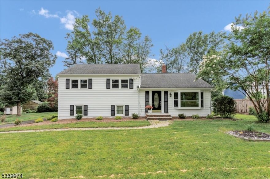 Renovated single family home with wonderful updated kitchen and bathrooms. The modern kitchen is equipped with stainless steel appliances, granite countertops, a tile backsplash, a breakfast bar, and a spacious dining area. A door from the kitchen opens to a deck and a private backyard with a pond less waterfall feature ideal for entertaining or relaxing. The driveway leads to a deep one-car garage with additional parking for 2 to 3 cars and ample space to turn around. Located in the desirable Normandy Park neighborhood, this split-level home includes three bedrooms and two full baths. The living room Boasts hardwood flooring, while the bedrooms are carpeted over hardwood. On the ground level, is a large family room with a full bathroom. Direct access to the driveway offers flexible use as a guest suite. The laundry/mud room with washer/dryer hookups is also on this level. A finished recreation room on the basement level adds additional living or play or work from home space. Enjoy easy access to both the Convent and Morristown train stations, as well as Routes 24, 78, and 287 for convenient commuting. Home is part of the Green Knolls, Featherleigh, Normandy Parkway neighborhood Watch community. This home is also close to top amenities: dining, golf, fine arts, Morristown Medical Center, Newark Airport, and NJ Transit. It's truly a rare find with space, style, and convenience. Don't miss your chance to Call this home yours!