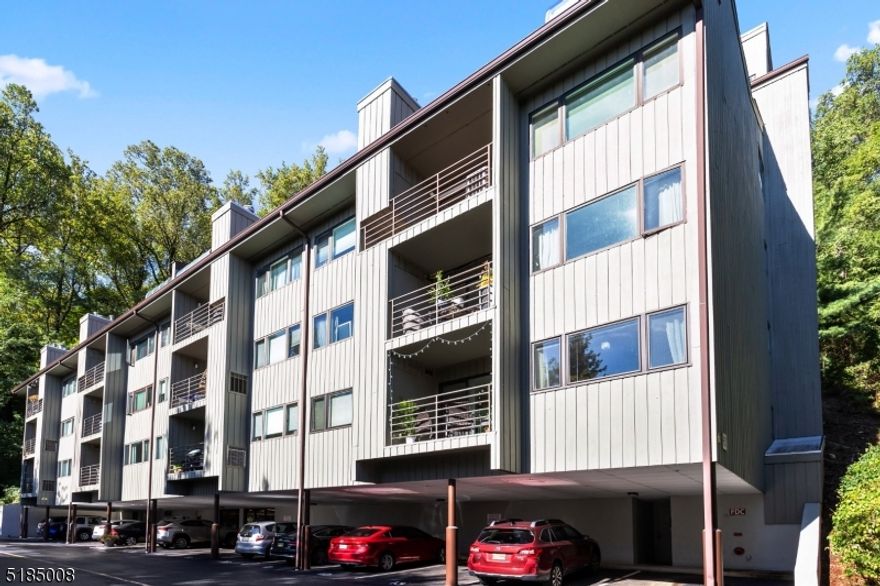 In town living yet private setting best kept secret in Morristown!  Great one floor unit with 2 bedrooms and 2 full baths.  Primary suite has 1 of the full baths and the other bath is adjacent to the 2nd bedroom.  Open floor plan to entertain and easily flow from Kitchen to Living Dining Room Combo.  A rare bonus in this complex, the sliding glass doors in Living Room open to the back patio on ground level!  Enjoy the privacy of facing Fort Nonsense State Park and you are minutes to Morristown's bustling busy downtown filled with new restaurants, shops, coffee houses, parks and don't forget the mid town direct train to NYC Penn Station!  Morristown also has so many things to do including the MPAC Performing Arts for shows and concerts, the Morris Museum, Historic sites too numerous to mention.  Secure lobby with access to owners and others must be buzzed in.  Extra storage at no charge for each unit.  Water is included in the HOA.  No stairs to enter the lobby and an elevator building make this easy living  2 Parking spaces per unit and overhang parking as available.