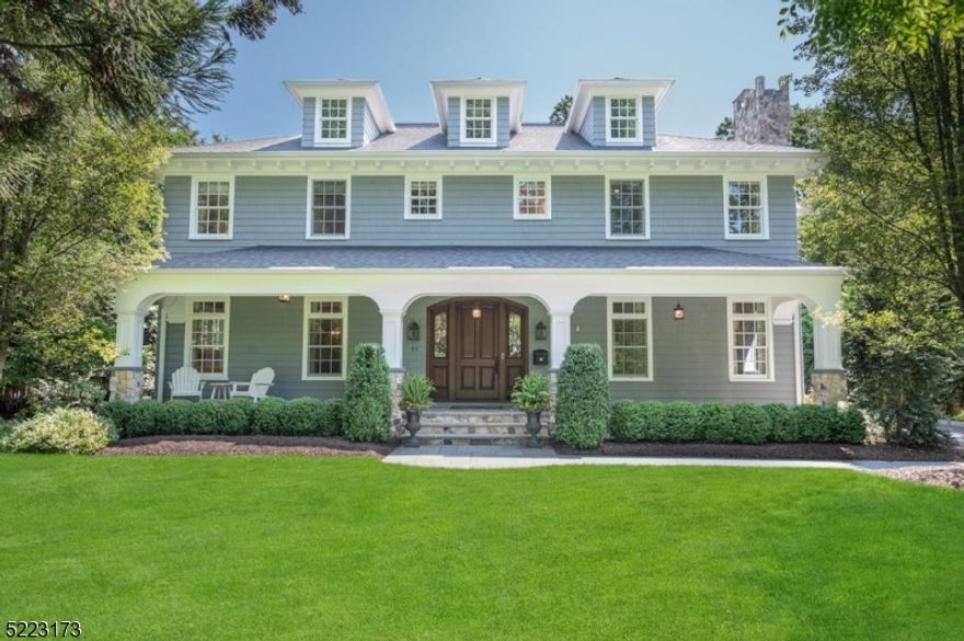 Be the 2nd owner of this magnificent 7,000 sq ft Colonial in the coveted Woodland Park neighborhood, which sits on a beautiful, private, level lot in close proximity to Franklin Elementary School and the New Providence Train Station. Step through the mahogany front door into a welcoming foyer with direct sightlines through to the sunlit family room centered on a gas-log stone fireplace with coffered ceiling, custom built-ins, and French doors accessing the rear terrace, ideal for indoor-outdoor entertainment.  The gourmet kitchen features a center island with breakfast bar, Subzero fridge/freezer, professional-grade Viking appliances, two sinks, a pantry, a breakfast room and an adjacent butler's pantry housing custom cabinetry, wet bar and beverage fridge. The banquet-sized formal dining room,  living room with gas-log fireplace, custom-fitted mudroom and study featuring custom cabinetry and French doors for privacy round out the 1st floor.  The sprawling 2nd floor offers 4 en suite bedrooms, laundry, and a primary suite with walk-in closet, gas-log fireplace, and luxe bathroom with 2 vanities, spa shower, jetted tub, Toto Bidet, and heated floor. The lower level with 10-foot ceilings offers 2 rec spaces, a wet bar, a 6th bedroom and en suite bath, 900-bottle mahogany wine cellar, home gym (wired to be a home theater) and laundry room. Outside choose to relax on the welcoming, heated front porch or the rear stone patio with wood-burning fireplace. Don't miss this beauty!