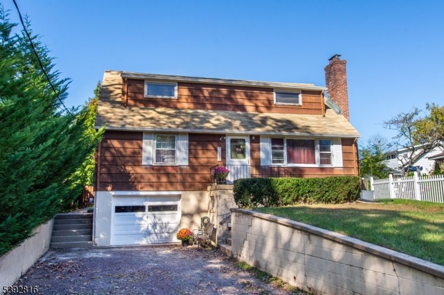 Welcome to 5 Seminole Trail, a charming Cape Cod"style home nestled in the sought-after Indian Lake community of Denville. This inviting 4-bedroom, 2-bath residence offers a perfect blend of comfort, character, and convenience. Step inside to a welcoming living room centered around a cozy wood-burning fireplace ideal for relaxing evenings or gatherings with friends. The eat-in kitchen features stainless steel appliances, ample cabinetry, and a warm, casual eating space that overlooks the backyard. With two bedrooms and a full bath on the first floor, the home offers flexible living options, while the second level provides two additional spacious bedrooms and another full bathroom (not currently working). The full basement adds versatility perfect for storage, a home gym, or family room and includes direct access to the attached one-car garage. Outside, enjoy the peaceful backyard from your deck overlooking a level yard, great for entertaining, gardening, or play. Located in the friendly Indian Lake community, you'll have access to lake living with membership, including swimming, boating, and year-round activities, all while being just minutes from Denville's vibrant downtown, top-rated schools, and public transportation, major hwys & commuter routes. Discover the perfect balance of lake community charm and suburban convenience at 5 Seminole Trail.