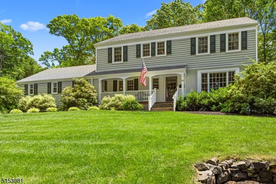 Create a lifestyle where everyone has a place to enjoy peace and quiet in the heart of Summit's prestigious Rolling Hills section.  This immaculate five bedroom Colonial offers a perfect flow for easy entertaining.  At the front of the home is a large spacious den/office with fireplace and wet bar.  The gracious foyer leads to the formal Living Room with gleaming hardwood floors, a wood burning fireplace,  access to the comfortable family room, and  formal Dining Room overlooking the expansive yard.   Casual dining is a pleasure in the recently updated kitchen that features a large island, stainless steel appliances and a super convenient mudroom.  The garage is located right by the kitchen for easy grocery unpacking; and laundry is right there too. The second floor offers five bedrooms and two and a half bathrooms that include a primary suite, the ideal place to rest and recharge.  When exploring the lower level, there are even more possibilities for relaxation, and recreation.  Whether you enjoy playing and creating, chilling and watching movies, or simply doing yoga or working out; the finished basement with full bath and tons of storage adds tons of great living space - all protected by a full house generator.