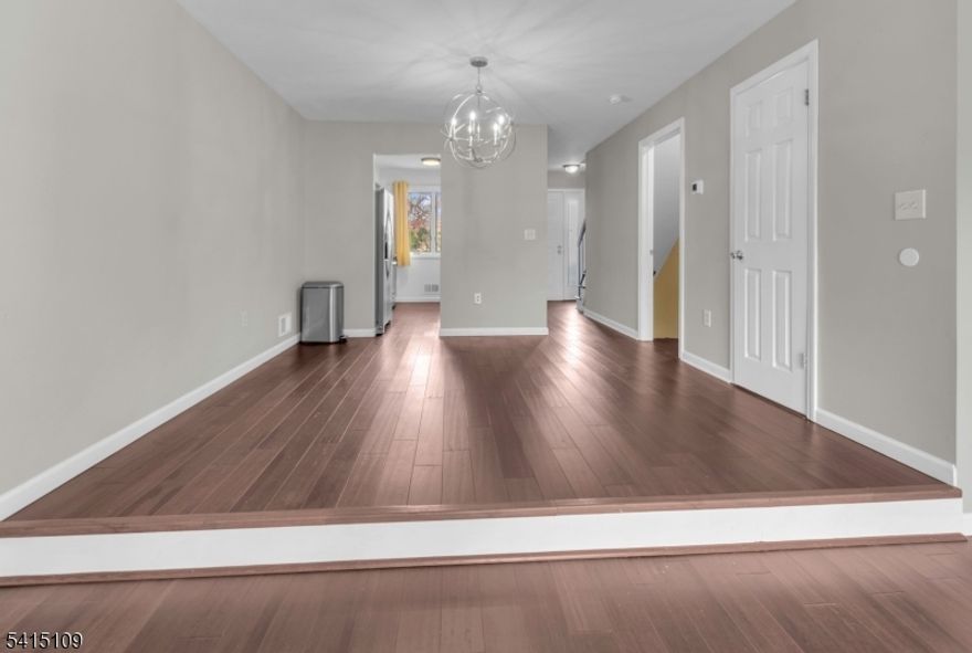 Welcome to this spacious 2-bedroom, 1.5-bath townhouse located in the desirable community of Somerville, NJ. This well-maintained unit offers a comfortable and functional layout with beautiful hardwood floors throughout and a modern kitchen featuring stainless steel appliances. The kitchen opens seamlessly to the dining and living room areas, creating a bright and inviting open-concept space perfect for both everyday living and entertaining. From the living area, a sliding glass door leads to a private outdoor patio, providing the perfect place to relax, enjoy your morning coffee, or host small gatherings. The home also includes a washer, dryer, and refrigerator, adding convenience and making this property truly move-in ready. Location is one of the many highlights of this home. The property is just 4 minutes from the Somerville Train Station, making commuting simple and efficient. It is also within 1 minute driving distance to Robert Wood Johnson University Hospital. Central to a  variety of restaurants, shopping, parks, and local entertainment.  Within 15 minutes of other major train connections, offering even greater commuting flexibility. Whether you are a first-time homebuyer, downsizing, or looking for a great investment opportunity, this townhouse offers a wonderful combination of comfort, convenience, and prime location. $160 monthly assessment fee until September 2029 - assessment fee to do siding replacement, gutters replacement, fencing replacement