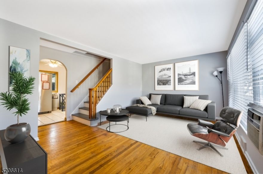 Freshly painted cape in prime location in Rahway. This cape is ready to move in! Featuring a bright and airy living room with hardwood floors, eat in kitchen, two bedrooms and full bath on ground floor. Second floor with an ample bedroom with new floors. Full unfinished basement with endless possibilities! Great size enclosed patio that leads to the spacious fenced in backyard. Attached garage and central heating ready to central AC to be installed. This is a must see!