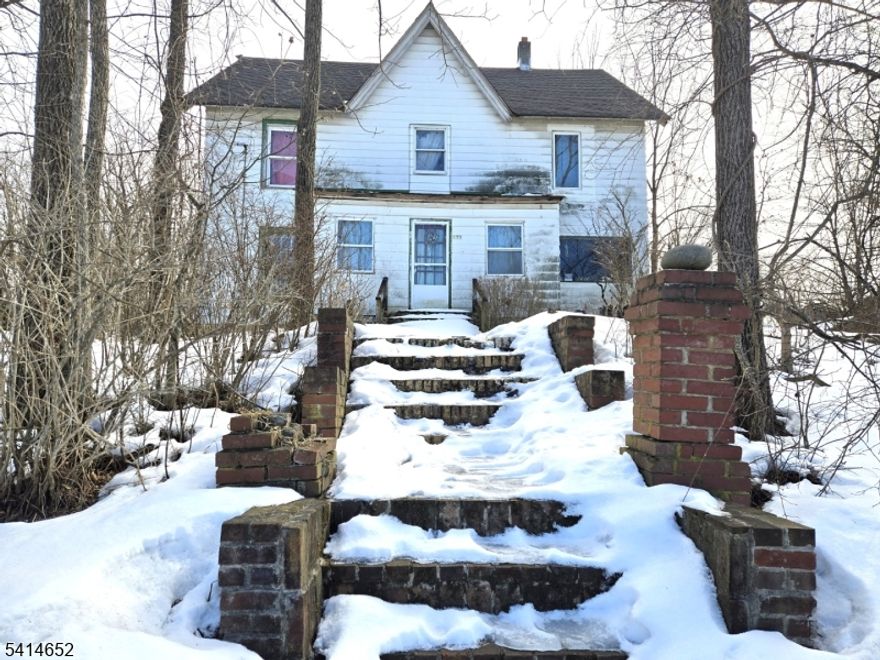 Calling all hearty contractors.  This house needs an entire renovation to bring it back to its former beauty and glory.  Perched on a knoll set back from the road.  Currently a mother daughter, with separate entrances.   Separate living area has a summer kitchen, full bathroom and large combo bedroom/living area. Beautiful views of fields across the street.  Woods behind the house. Correct tax amount soon to come. Selling "as-is" buyer to obtain any town or state CO's for closing.  Contents of the house are included in the sale.