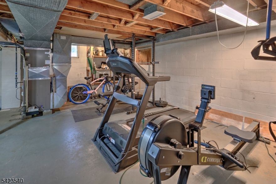 Charming and thoughtfully updated home in the heart of Millington, offering comfort, flexibility, and an unbeatable location. Bright living spaces include a newly built-in Murphy bed perfect for guests, a home office, or multi-use living.Enjoy being just a short walk to Oakflower Brewing Company and the Millington train station for an easy NYC commute. The kitchen and bathrooms were updated in 2019, complemented by newer appliances (all 2"3 years old), a new furnace (2019), and a hot water heater (2022). Recent exterior improvements include a new sidewalk (2023), patio (2024), and driveway (2024), along with refinished hardwood floors (2024).