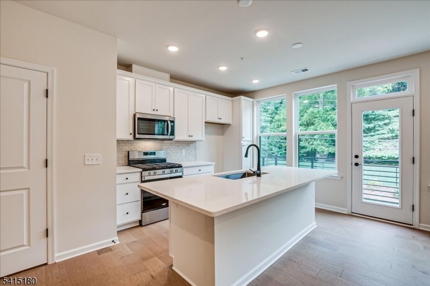 Be among the first to enjoy modern living at Scarlet Place, New Brunswick's newest townhome community. This brand-new 3-bed, 2.5-bath home features bright open-concept living, a stylish kitchen with quartz countertops and stainless steel appliances, and a layout designed for both entertaining and everyday comfort.Residents enjoy resort-style amenities at Vermella including a pool, fitness center, and lounges plus Scarlet Place additions like a tot lot, green pavilion, and dog run.The home includes a private garage with EV charger, driveway parking for two, and energy-efficient systems such as a tankless water heater for lower utility costs.A community shuttle offers easy access to the New Brunswick NJ Transit station, ideal for commuters heading to Jersey City or NYC. You're minutes from Rutgers, major hospitals, and downtown dining and shopping, with Routes 1, 18, and the NJ Turnpike close by.All of this is offered at $3,700 per month, making it one of Scarlet Place's best values. Schedule your private tour and be among the first to call this new community home.