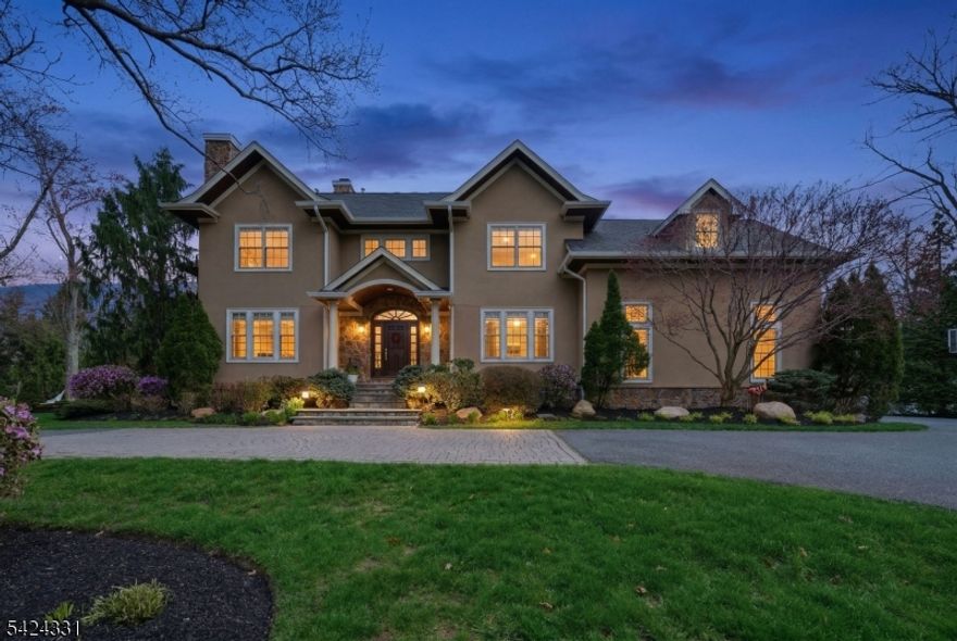 Experience the Best of Lakeside Luxury at 11 N Pocono Road. This Stunning newer-construction Colonial, perfectly positioned on the Waterfront of Sunset Lake in the highly sought-after Mountain Lakes community! This residence combines Timeless architectural design with modern finishes This move-in ready home offers 6 bedrooms, 3 full bathrooms, and 2 half baths, delivering the perfect blend of Space,Comfort, and Modern living.Sun-drenched interiors, an Open-concept layout, and timeless design create an inviting atmosphere ideal for both everyday living and elevated entertaining.Rich hardwood floors,Oversized windows, and thoughtfully designed spaces enhance the home's Warm and welcoming feel.The Gourmet Kitchen serves as the Heart of the Home, featuring High end finishes, Ample Cabinetry, and Seamless flow into Expansive living and dining areas. Generously sized Bedrooms provide a peaceful retreat, while Multiple Flexible living spaces offer options for a Home office, Guest suite, Gym, or Playroom.Outside, your private Lakefront backyard on Sunset Lake-perfect for Morning coffee, Sunset views, Outdoor dining, and Year-round enjoyment in a serene setting.Located in a top-rated school district and just minutes to downtown, parks, dining, and NYC transportation, this home offers a rare combination of Luxury, Lifestyle, and everyday Convenience.Don't miss this rare opportunity to own this Lakefront Beauty! Schedule your private showing today!