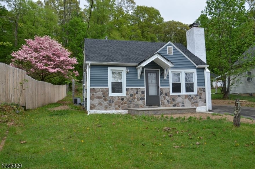 Charming 2-Bedroom, 1-bath home with a bonus room on a quiet dead-end street in Mine Hill, NJ. This beautifully maintained single-family home offers the perfect blend of comfort and convenience. With a cozy living area, this home is ideal for those seeking a move-in-ready property with a welcoming atmosphere. The updated kitchen and bathroom add modern flair, while a cheerful wood-burning fireplace in the living room creates the perfect setting for chilly evenings. Step outside to your private backyard, where a spacious patio awaits, ideal for entertaining or simply enjoying a quiet afternoon in the Sun. Located on a tranquil dead-end street, you'll enjoy peace and privacy, yet be just minutes away from local shopping, schools, and restaurants. Whether you're hosting gatherings or relaxing at home, this property has everything you need. Don't miss your chance to own this charming home in a prime location
