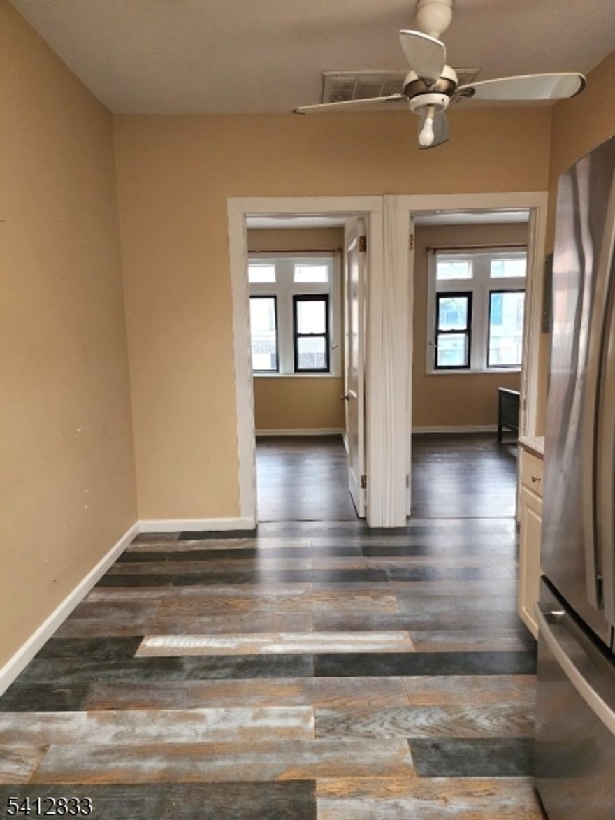 Move right into this two bedroom, one bath apartment located in desirable Montclair! Located right on Bloomfield Ave where you can walk to train, restaurants and shopping. Nice size bedrooms and wood floors throughout. Cozy apartment with tons of natural sunlight. (fridge in photo is now stainless steel, not white). Pets on case by case basis. No laundry in building, laundromat close by.