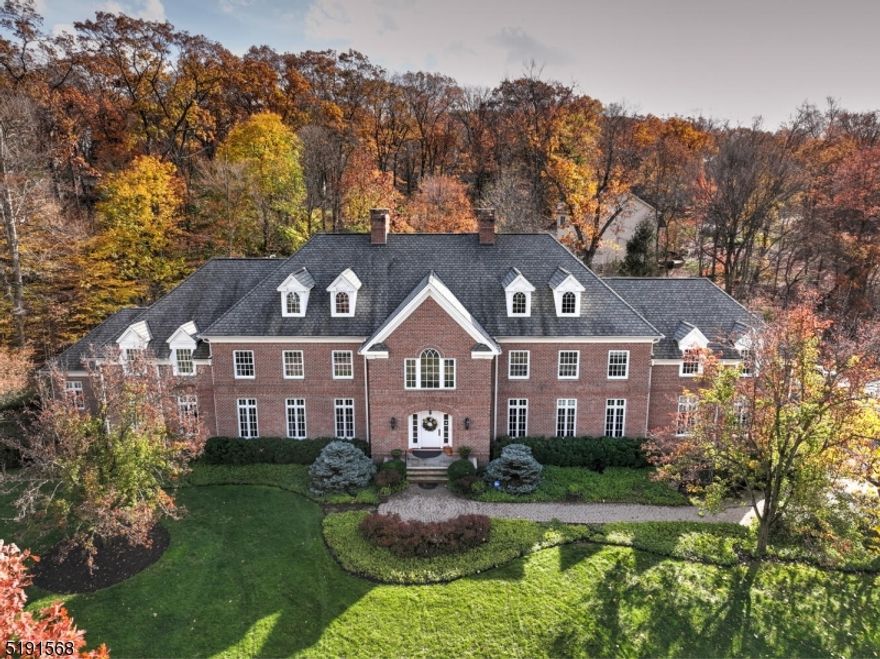 Truly amazing north facing Custom Full Brick Center hall Colonial nestled on the first ridge of the Watchung Mountains boasts over 8,000 square feet of elegance and grandeur! 4 Car side entry garage with over sized doors! Gleaming hardwood flooring throughout the entire home! Elegant Master suite on the first floor features two walk in closets, tray ceiling and gas fireplace! Lavish master bath with all the extras plus a master laundry room! Pocket doors lead to the massive grand Eat in Kitchen with lounge area, fireplace plus a generous granite center isle with all the trademark appliances! Walk in pantry plus a butlers pantry. Additional bedroom/office and full bath compliment the first floor! Second level features 4 generous sized bedrooms plus a second laundry room.  Jack and Jill bath supports two bedrooms plus an additional 2 full baths! Two walk in attics for storage plus a walk up third floor massive attic! The Grand entry is truly special with a massive center staircase with a chandelier lift! The full unfinished basement offers 14 course block for future finishing! Great location with easy 5 minute access to Rt 78, 22 and 287!  The construction quality of this home is astounding! Amazing home in the Martinsville section of Bridgewater ready for occupancy!