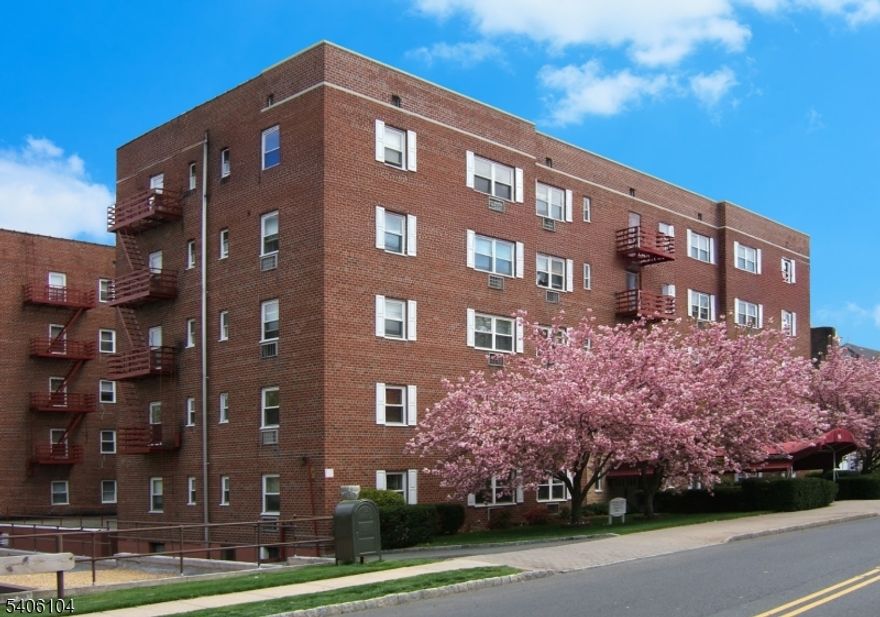 Welcome to Cranford Towers, Suite 4E This beautifully renovated two-bedroom, one-bath condominium overlooking the Rahway River is move-in ready! Step into a welcoming foyer and hallway with rich cherry hardwood floors. The spacious bedrooms and cozy living room feature plush wall-to-wall carpeting, while the kitchen and bath boast elegant ceramic tile. Freshly painted with neutral tones and new appliances, this home offers comfort and style in every corner. Don't miss this incredible opportunity! Rooms - Two Bedrooms, Bathroom, Kitchen, Foyer, Four Closets. Additional Storage - A secure storage area on the lower level. Parking - One assigned indoor parking space (tandem) and bicycle storage are included. Smoking - Cranford Towers is a non-smoking building. Smoking is not permitted in the individual condominium units, common areas, or anywhere on the premises. NOTE: The information provided is believed to be accurate and reliable. However, no warranties, expressed or implied, are made regarding its completeness, accuracy, or reliability. It is the buyer?s responsibility to independently research all information before making any decisions or purchases.