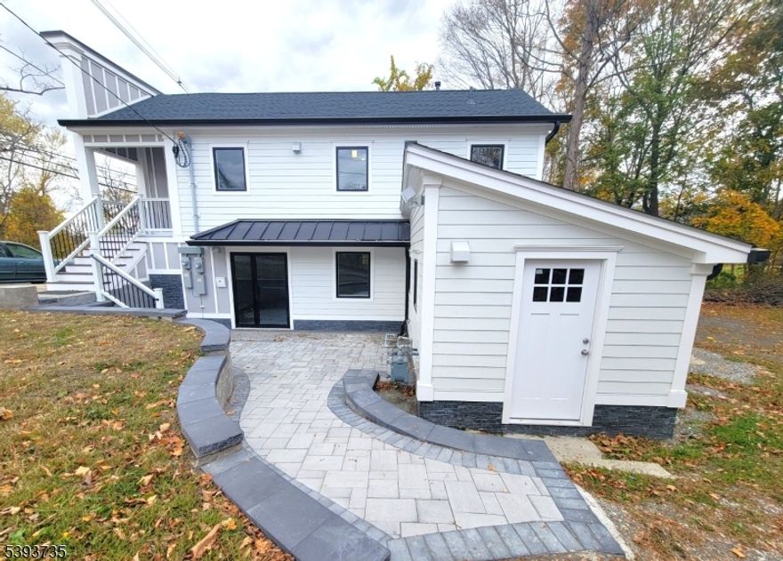 Looking for an investment property that is fully turnkey and ready to make money? This is the one! On a highly visible and easily accessed lot, this fully rebuilt commercial mixed-use building offers a spacious, open concept 2-bedroom, 1 bathroom apartment upstairs with separate utilities and washer and dryer assess in storage/utility room. Beautiful finishings, large bedrooms and closets with brand-new appliances and finished attic space for storage. The 800 sq ft downstairs commercial space is a blank canvas and would be a perfect ground level unit for a multitude of uses including things like a cosmetology business, professional services, business office space, etc. Multiple entrances to the office space with a deck overlooking the brook. The commercial space has its own dedicated, beautifully remodeled bathroom and storage space. This building is completely redone from the foundation up including plumbing, electrical, flooring, sheetrock, appliances, etc. Inside and out, this has been meticulously rebuilt and no corners cut. Brand new roof, framing, insulation, electric drops from the street, new meters, panels, water heaters, HVAC system, too much to add! No need for any capital expenditures on this property. Just rent them out or live in the upstairs unit and rent the space below! Backs up against beautiful views of Clove brook and access to community park just behind the property. According to survey there is parking space in the back and street parking in front..