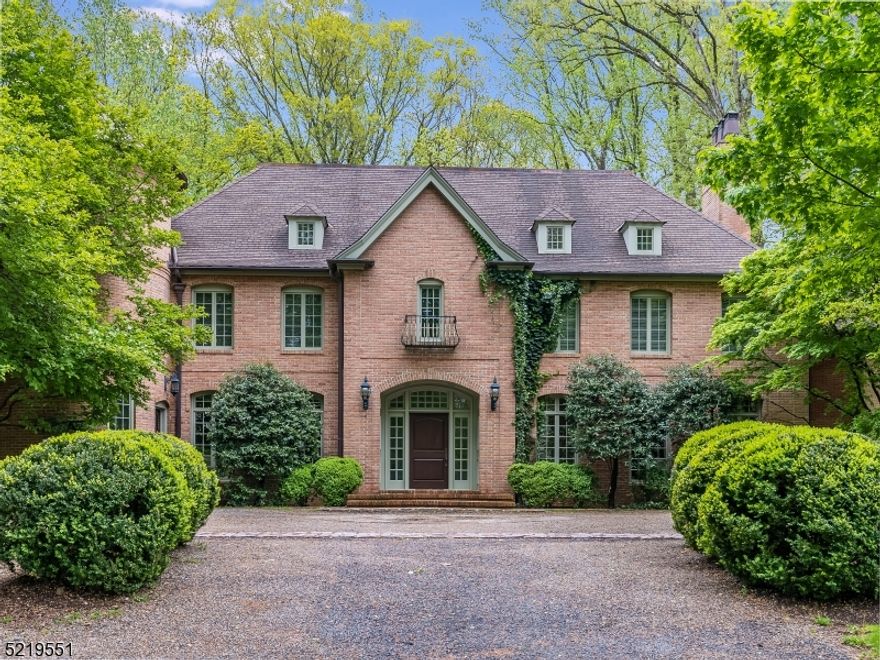 Architect Patrick Burke designed all brick European style custom home on private prof landscaped lot. Exceptional construction and craftmanship including hardwood and travertine marble flooring, full brick exterior, extensive decorative moldings, wainscoting, coffered ceilings, furniture quality built ins, 4 stop elevator, designer kitchen, high end light fixtures, generator, bluestone patio. Impressive basement finishes. It is rare to find the attention to detail found in this home. Convenient to major highways, commuter lines, world class restaurants, top rated schools, recreation venues and cultural events.