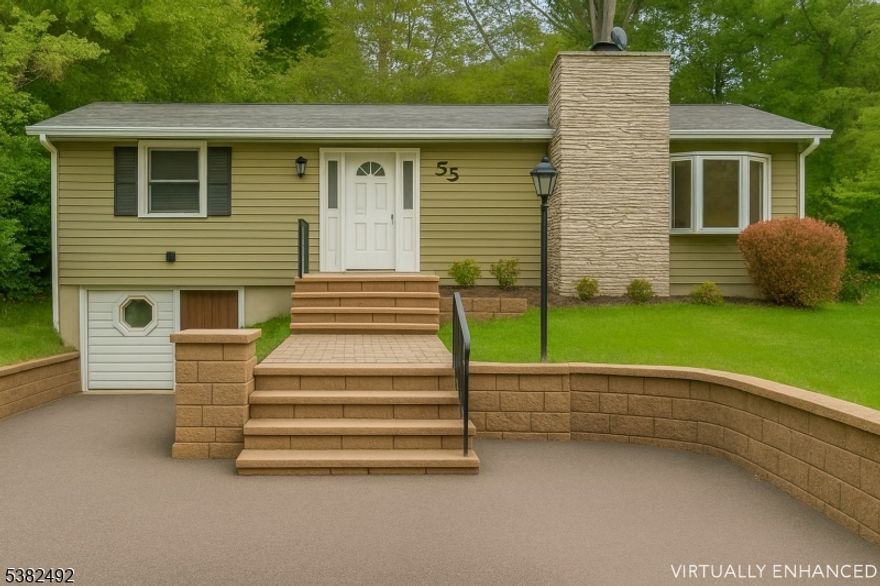 Welcome to 55 Orchard Drive! Nestled in the sought-after Pleasant Valley Lake community, this fully renovated raised ranch features 3 bedrooms and 1.5 baths. The inviting living room offers a fireplace and large windows, while the renovated eat-in kitchen includes sliders opening to a beautiful backyard, along with newly updated appliances and stylish finishes. The lower level features a large open space perfect for a family room, plus a new storage room, laundry room, half bath, and bedroom/bonus or office space, all newly carpeted with a walkout to the garage. A new septic system is currently being installed. Enjoy modern comfort and versatile living in this charming lake community   move right in and make it your own!