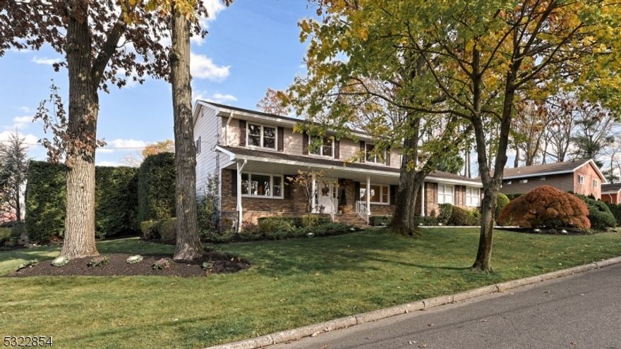 Located less than 10 minutes from the iconic GW Bridge, this exquisite home is nestled in a community surrounded by luxurious multi-million dollar estates. Set on a majestic corner, the property boasts a private yard w/ palatial mature trees & lush greenery providing complete seclusion for your very own oasis that includes an in-ground pool & an expansive paver patio, perfect for relaxing in absolute privacy. This home features 5 spacious BR's, including a luxurious primary suite w/ walk-in closet & full BA. The grand LR & formal DR are ideal for hosting even the largest gatherings, providing an elegant backdrop for any occasion. The kitchen offers beautiful cherry cabinetry, center island, radiant heated floors & eating area that overlooks the cozy FR, anchored by a stone-faced FP. Additional features include a 2-car garage & finished basement offering multiple rooms, full bath, plenty of storage & walk-out access to the yard. This is the opportunity of a lifetime; schedule your private tour TODAY!