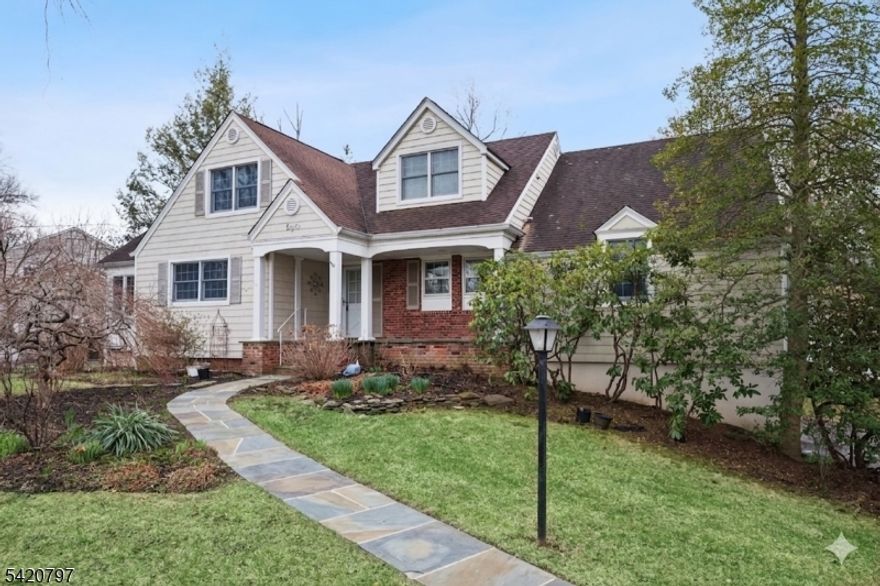 Nestled in a desirable Morris County community, this custom-built Colonial sits on a beautifully manicured lot, offering space, comfort, and lifestyle convenience. This expansive home features an exceptional outdoor living with a spacious deck, and covered patio. A charming front porch opens to a sun-filled living room and formal dining area with hardwood floors, crown molding, and walls of windows with sliding glass doors. A cozy fireplace anchors the space. The expansive deck seamlessly connects both main living areas, creating an ideal flow for indoor-outdoor entertaining. The spacious kitchen offers custom cabinetry, granite countertops, SS appliances, wet bar, a center island, and a breakfast nook. The main level includes a primary suite with en-suite bath, plus 2 additional bedrooms and a hall bath. Upstairs features 2 large bedrooms, one with a private balcony, a sunlit office, and a renovated full bath with a chick soaking tub, separate shower, and dual vanity. The lower level offers a large recreation room with a 2nd fireplace, full bath, storage, and sliding doors to a covered patio. Enjoy all that Morristown has to offer, including a vibrant downtown with renowned restaurants, boutique shopping, theaters, along with beautiful parks, trails, and nearby town pool. Convenient to major highways and NJ Transit for a direct NYC commute. Property is owned by a trust. Executor of the trust is a licensed real estate person affiliated with the listing brokerage.