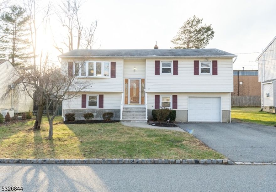 This special home is perfect for those seeking to live in a nice neighborhood near Lake Parsippany, parks, shopping, and commuter routes. You'll love the flow of the two finished levels. The upper level has a spacious living room open to a formal dining room, an updated kitchen with granite counters, three bedrooms and full bath. The lower level has a family room with walkout to the backyard, bedroom, full bath, office/home study area, and laundry room. The flat and fenced backyard has a patio with space for outdoor furniture and barbeque grill. Within a few blocks, there are lakeside sitting benches for use by area residents and an optional membership for beach and fishing access. Also nearby is the Lake Parsippany Park with playground, basketball court, and ball field. This is a convenient location to routes 202, 10, 46, 287, and 80. Credit and income verification is required. Tenant is responsible for the first $100 of each repair.