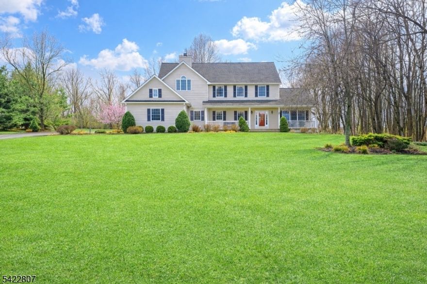 Bright and inviting, this 4-bedroom, 2.1-bath Colonial offers the perfect balance of comfort and style. The open-concept living room and kitchen feature abundant natural light, granite countertops, stainless steel appliances, and a breakfast bar. Formal dining and family room provide ample space for entertaining. Main-level laundry adds convenience. Upstairs, the primary suite boasts a luxurious bathroom with a stall shower, soaking tub, and double sinks. Set on 2 acres, this home combines timeless charm with modern amenities for everyday living and entertaining.