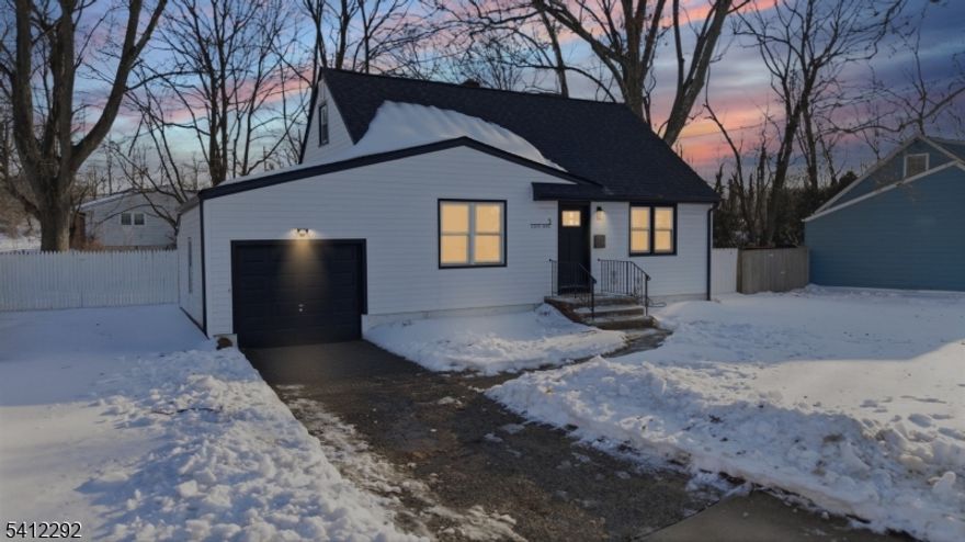Welcome to 5 Lois Avenue in East Brunswick, a fully remodeled Cape Cod that delivers far more space and impact than you would expect at first glance. From the moment you walk in, the quality of the renovation is clear. Refinished hardwood floors run throughout the main level, creating warmth and continuity. The kitchen has been redesigned with quartz countertops, new appliances, and clean modern finishes that feel current without being trendy. The first floor offers two generously sized bedrooms along with a beautifully updated full bath featuring porcelain tile and a deep soaking tub. Upstairs, the primary suite offers privacy and comfort, complete with its own beautifully tiled bathroom and sleek shower. The basement is one of the most impressive features of this home. For a Cape Cod, the size is unexpected. This expansive lower level offers flexibility. Whether you need a game room, media space, home office, gym, or all of the above, the square footage allows you to truly design it. Outside, the fenced backyard is spacious and ready for entertaining, play, or simply enjoying the outdoors. The location is hard to beat. East Brunswick High School is less than half a mile away. Opportunities this close to the high school are rare. Central Elementary is also nearby. Charming on the outside and surprisingly expansive inside, 5 Lois Avenue combines thoughtful updates, flexible living space, and an unbeatable location!