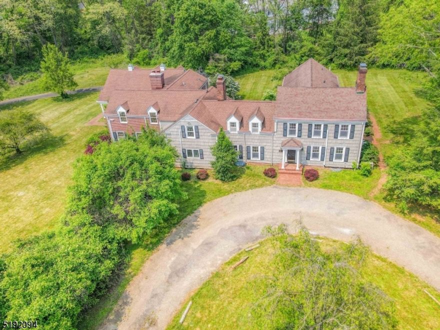 MAGNIFICENT LUXURY RETREAT!! Here is a great opportunity to own a luxurious and expansive property located in the prestigious New Vernon section of Harding Township. This stunning estate sits on 4.56 acres of land and features two separate dwellings on the property.This property offers the perfect blend of old world charm and modern convenience. Just 5 miles from downtown Morristown and Madison, it offers the perfect retreat from the hustle and bustle of city life, with the peace and serenity of country living. Some of its features include five fireplaces, a huge gourmet kitchen with chef grade appliances, built-in banquette, and a massive center island with granite countertops. The adjoining family room boasts custom cabinetry and a beamed ceiling, perfect for entertaining guests. Enjoy stunning pastoral views from every room in the house, including his and her offices, a butler's pantry with wine bar, a game room with two walls of glass. The elegant primary bedroom suite features a vaulted ceiling Palladian window, fireplace, and an expansive luxury bath with a Jacuzzi and double shower. Don't miss this opportunity to own a truly one-of-a-kind property in the heart of Harding Township. Needs major repairs and vision to make this your dream estate. Great upside value potential! Carriage House is Tenant Occupied. Priced reduced 6/30/23.