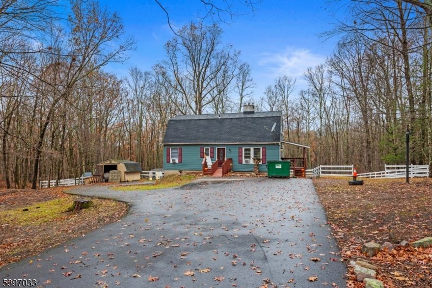 Could this be the one? This 5.13 acre property, that backs to state land and has Little Flatbrook running across the back of the property, is perfect for horses with a 2- stall barn and wood fencing. This well maintained 3-bedroom, 3 bath cape cod is located on a quiet country road in a peaceful, serene setting. A new front porch with a handicap ramp, new shutters and a beautiful, new entryway door are evident as you approach the home. Once inside you will notice the new vinyl flooring and sliding glass door that leads to an updated deck. Freshly painted throughout. The first floor offers a living room with a wood-burning stove, dining room, kitchen, 2 bedrooms and the main bath. The second floor has a bedroom, full bath, kitchen, living room and a sitting room (currently being used as a dining nook). The full partially finished basement has another full bath, laundry area, utility room, storage room, wood burning stove and additional space which could be used for a variety of uses. There is an oversized, attached, 1 car garage with a workshop located off the basement. The property has a storage shed and a generator hookup. The large driveway offers plenty of parking. This property is close to Stokes State Forest, Delaware River, Buttermilk Falls, Sunrise Mountain and Milford, Pa.