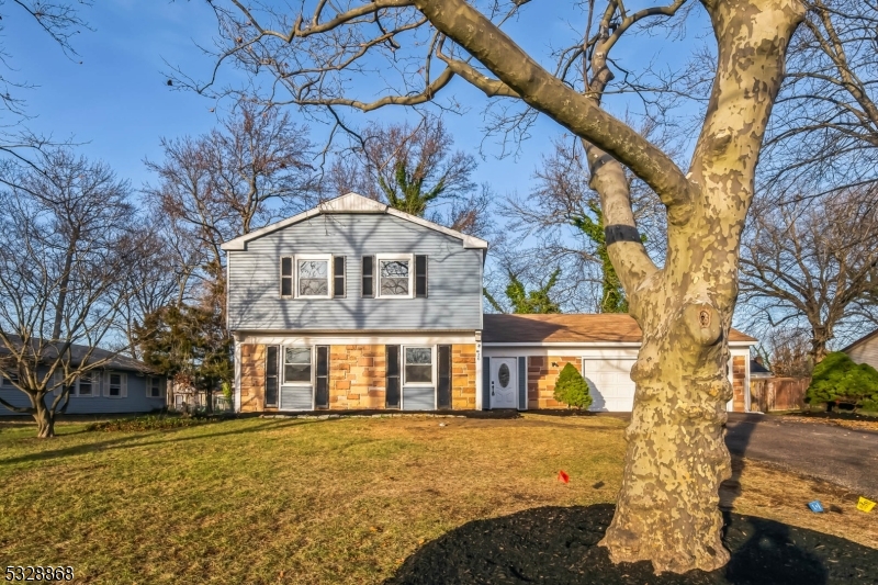 Welcome to this beautifully renovated single-family home, offering a perfect blend of modern updates and timeless charm. The main level boasts a bright, open floor plan with seamless flow between the spacious living room, formal dining area, and a large eat-in kitchen. The kitchen is a true highlight, featuring stunning quartz countertops, sleek stainless steel appliances, and elegant white shaker-style cabinetry, making it a chef's dream. A convenient half bath completes the main floor, offering extra comfort and functionality. Upstairs, you'll find four generously sized bedrooms, including a luxurious primary suite with a private bath equipped with dual sinks and a walk-in closet for ample storage. The fenced backyard is ideal for both relaxation and entertainment, featuring a covered patio for outdoor dining or lounging. This home is move-in ready, offering style, comfort, and convenience in a prime location. Don?t miss the opportunity to make it yours!