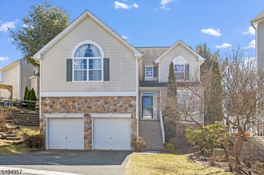 Welcome to this stunning 4-bedroom, 2.5-bath Elmwood model in Mount Olive, NJ's highly sought-after Woodfield community. This meticulously maintained colonial home boasts a spacious and elegant floor plan, perfect for modern living. The eat-in kitchen features updated stainless steel appliances with a separate eat-in nook, a Vaulted ceiling, a gas fireplace in the family room, and a formal dining room. The upstairs luxurious primary suite offers a vaulted ceiling, a walk-in closet, a spa-like en-suite bath with a soaking tub, and a separate shower. Three additional generously sized bedrooms share a well-appointed full bath. The finished basement provides extra living space, perfect for a home office, gym, or media room. Located in the highly rated Mount Olive school district, Woodfield offers fantastic amenities, including multi-use sports ct, playground, and walking trails. Conveniently close to major highways, shopping, and dining, this home is a must-see.