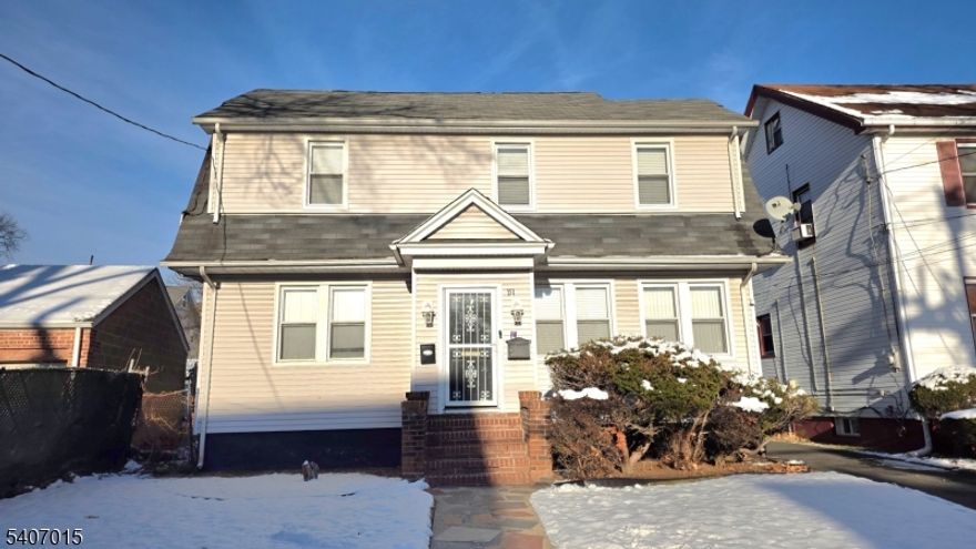 Come and see this spacious 4 bedroom Colonial home that has a backyard deck, a sunroom, and a detached garage! Close to public transportation, shopping, and schools.