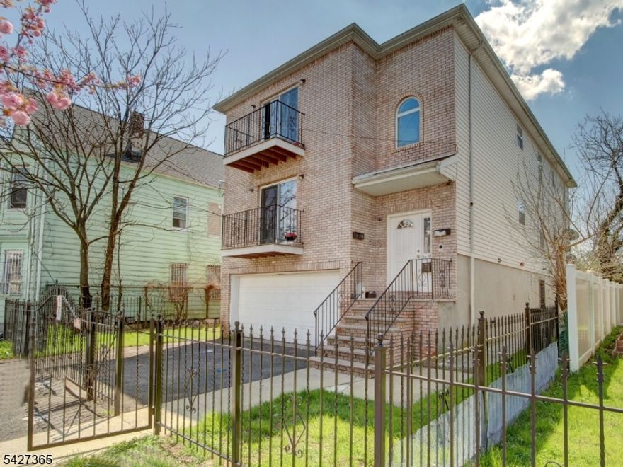 Massive Three-Family Home in the Heart of Newark.This spacious three-family home offers plenty of natural light and modern amenities. The first floor features 2 beds, 1 bath, while the second and third floors each offer 3 beds, 2 baths with ensuite bathrooms. The first and third floors have been recently renovated. Each unit boasts a large kitchen, open living/dining areas, walk-in closets, and central heating/air. Additional features include a built-in two-car garage and prime location near transportation, schools, shopping, places of worship, and direct access to buses and trains to NYC.