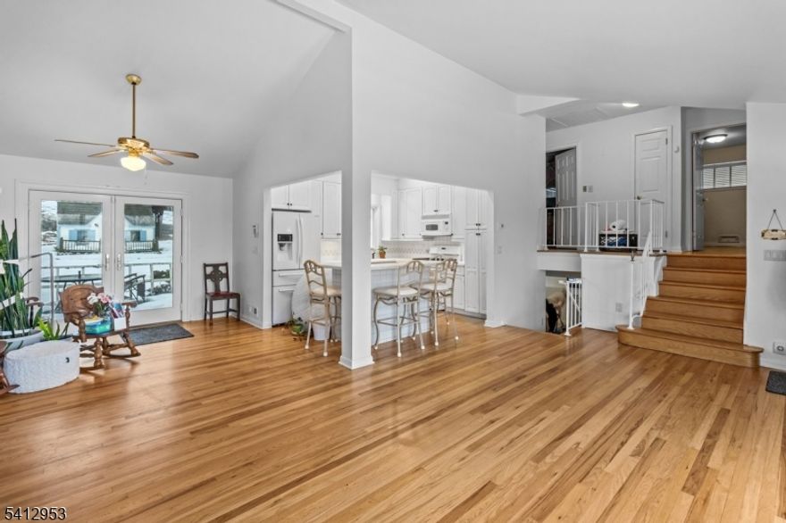 Great Location! Wonderful Neighborhood!  Gorgeous Property! Rarely see Homes available for sale in this community! Open, Spacious, Dynamic Floor Plan with High Ceilings. Lot of Natural Sunlight. Hardwood Floors. Living Room with Gas Fireplace. Formal Dining Room with French Door to Patio Overlooking Spectacular Backyard! Updated Kitchen with Large Island with Plenty of Room for Bar Stools. Primary Bedroom has an Updated Primary Bath. 3 Bedrooms, 2 1/2 Baths. Lower-Level Family Room (Possible 4th Bedroom). Lower Level has an Updated Powder Room. Home Generator. Doll House in Backyard also has Electric. Tremendous Amount of Parking. Very Convenience to NYC Train and NYC Bus!