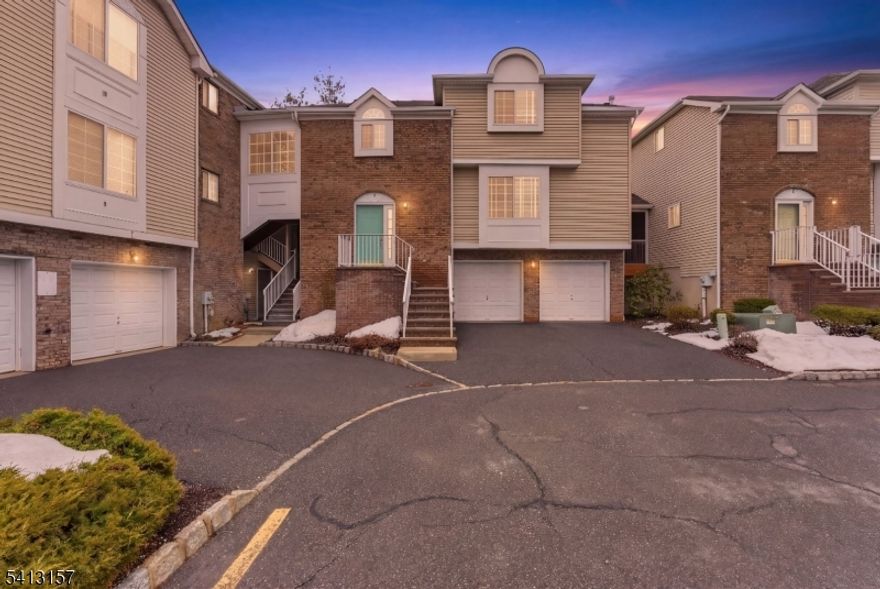 If you have been looking for the perfect home in Berkeley Heights under a million dollars, look no further.  Welcome to this beautifully maintained 3-bedroom, 2.5-bath Townhome, located with convenient access to transportation, major highways, and key corporate campuses (Nokia, Summit Health, and Connell Park).  When you enter the home, you are welcomed by a warm and inviting living room, with a gas fireplace that creates a natural focal point and an ideal setting for relaxing.  Walk up to a large eat-in kitchen which opens to a large flexible space that lends easily to your lifestyle, whether you prefer casual living or more formal entertaining.  Exit the living room to your private deck ideal for those quiet nights, unwinding after a long day.   The second floor includes a large primary suite with private ensuite bath and two well sized guest bedrooms and additional full bath.  A true highlight of the home is the lower level, offering access to the private 2 car garage and additional living space. The finished basement is perfect for a recreation room, media area, gym, or work-from-home space, this level provides endless possibilities to suit today's needs.  With its combination of flexible spaces, convenient location, and access to great schools, this home presents a wonderful opportunity to enjoy both comfort and flexibility.