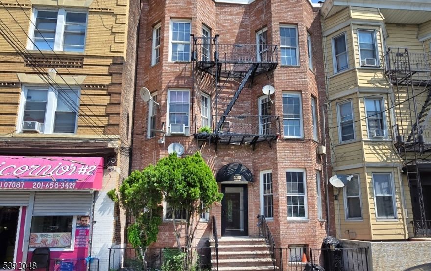 Welcome to 130 45th Street, a stunningly updated 2-bed, 2-bath condominium offering 670 sq ft of thoughtfully designed living space in a boutique 6-unit building. This bright, open home features a gorgeous new kitchen with granite countertops, a peninsula breakfast bar, modern pendant lighting, and brand-new stainless-steel appliances. The warm hardwood floors, high ceilings, and recessed lighting create a sophisticated and airy atmosphere throughout. The layout includes a spacious primary suite with a private bath, a second full bathroom, and a comfortable second bedroom. Each unit has its own dedicated basement storage, adding convenience. Everything in this home is brand new HVAC, finishes, fixtures allowing you to move in with complete peace of mind. Perfectly located near local shopping, dining, and transportation options for an easy NYC commute, this condo combines modern comfort with unmatched convenience.